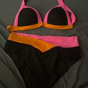 I am selling this beautiful PINK bathing suit I can’t fit